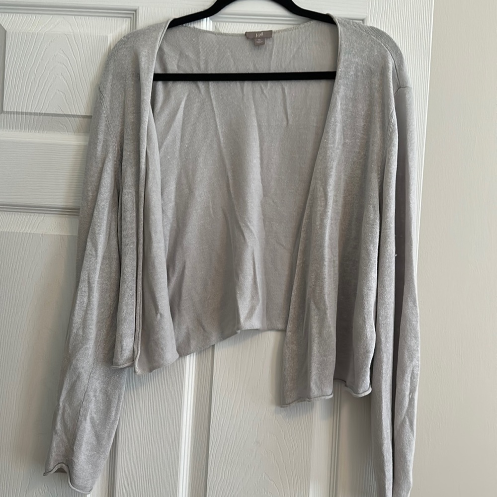 Overtop that covers arms on cool days/nights. It is so soft and looks great.